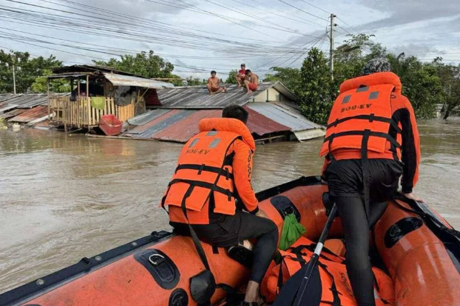 1444x920 in this photo provided by the philippine coast guard residents stay on roofs as rescuers ar